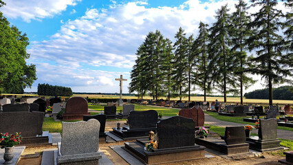 cemetery in Dziewkowice - cross, graves and trees - obrazy, fototapety, plakaty