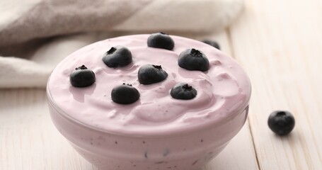 Obraz na płótnie Canvas Blueberry Yogurt with fresh berries on a white table. healthly food.