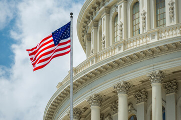 Washington DC Capitol dome detail with waving american flag - obrazy, fototapety, plakaty