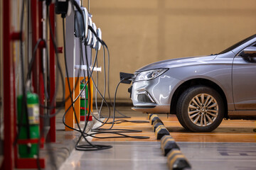 EV charging an electric car.Power supply for electric car charging. Socket for electric car battery...
