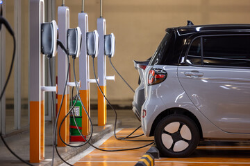 EV charging an electric car.Power supply for electric car charging. Socket for electric car battery...