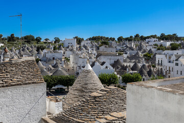 ALBEROBELLO, ITALY , JULY 11, 2022 - Panoramic view of Alberobello, province of Bari, Puglia, Italy