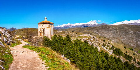 Santa Maria della Pieta church in Rocca Calascio - Abruzzo Gran Sasso national Park trail - South Italy landmark - obrazy, fototapety, plakaty