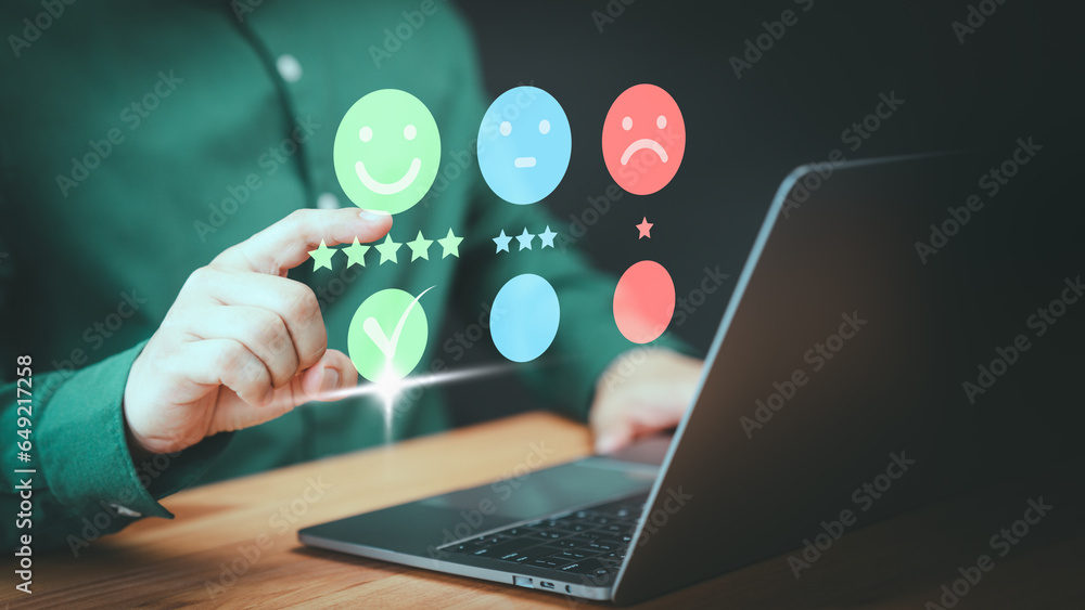 Poster user hand touch virtual screen on smile face icon to give satisfaction in opinion and service. custo