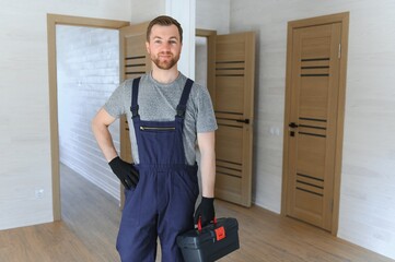 Builder on construction site. Manufactured Home News, modular home, conventional housing. Builder...