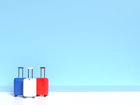 Travel suitcases in the colors of the flag of France on a white background with empty space for text. 3d illustration on the theme of business trips.