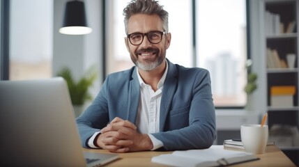 Obraz premium Portrait of business mature man at office desk with smile, Online report or social media, Internet.