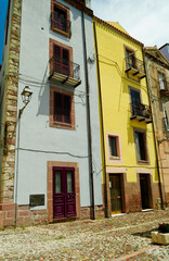 Fototapeta na wymiar Bosa, il centro storico del famoso borgo medievale con le sue case colorate, in provincia di Oristano. Sardegna, Italy