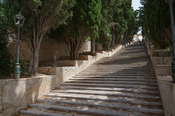Arta, Spain - 10 July, 2023: Steep steps up to Santuari de Sant Salvador, Arta, Mallorca