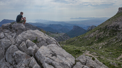 Mallorca, Spain - 13 June, 2023: Views of Alcudia Bay from Coll des Prat and the Tramuntana Mountains, Mallorca
