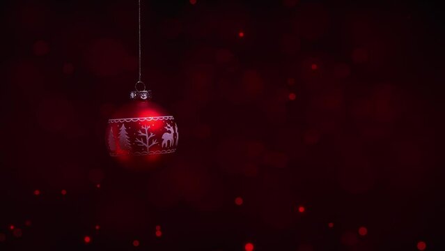 hanging christmas tree sphere decoration with Scandinavian pattern on abstract red slow motion bokeh light animation background, xmas backdrop concept with copy space