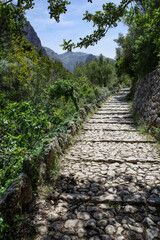 Mallorca, Spain - 12 June, 2023: The Barranc de Biniaraix and GR221 hiking trails in the Tramuntana Mountains, Mallorca