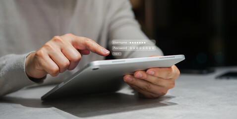 close up employee man hand type password on digital tablet to access account at office for security...