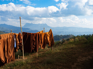 Doi Luang Chiang Dao mountain and hanging clothes under the sun - 649234094