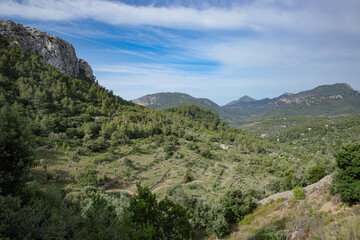 Fototapeta na wymiar Esporles, Spain - 11 June, 2023: Views of the Tramuntana Mountains from the GR221 trail, Esporles, Mallorca