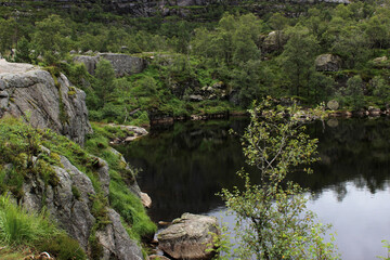 Fototapeta na wymiar Beautiful natural vacation hiking walking travel to Preikestolen massive cliff Norway, Lysefjorden