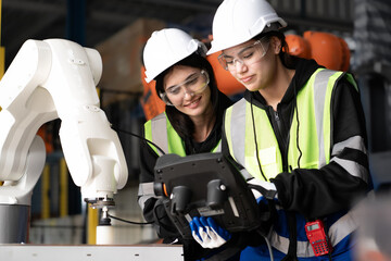 Electronic and robotic engineer working on robot arm maintenance in AI futuristic innovation...