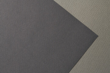 Fototapeta premium Rough kraft paper background, paper texture gray black colors. Mockup with copy space for text.