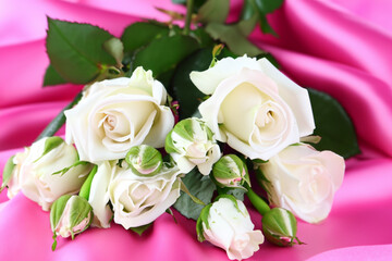 Beautiful white roses on pink satin close up, ai technology
