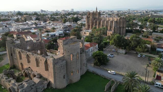 Flying past ruins of St George of the Greeks Church, towards Lala Mustafa mosque, a former cathedral that converted into a mosque after the Ottoman invasion of Famagusta (in today's Northern Cyprus)
