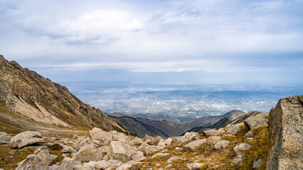 rocky mountain peaks in the clouds. fog in the mountains. highlands