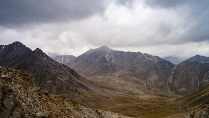 rocky mountain peaks in the clouds. fog in the mountains. highlands