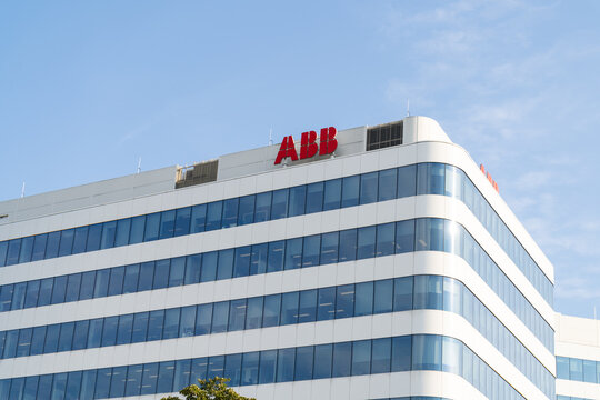Axis business center Krak&oacute;w. Office building in Cracow, with ABB logo sign, multinational corporation, global technology company, electrical equipment manufacturer on August 12, 2023 in Krakow, Poland