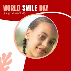 Composite of world smile day text and biracial girl smiling over pattern on red background