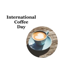 International coffee day text on white and cappuccino with heart in foam on wooden table