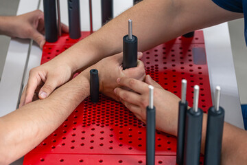 Development of movements of the radial wrist joint on a functional board for the hand.