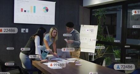 Anmation of social media icons against diverse colleagues discussing over documents at office - Powered by Adobe