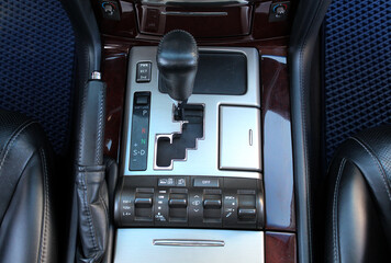 Automatic transmission gearshift stick, Closeup a manual shift of modern car gear shifter. Control...