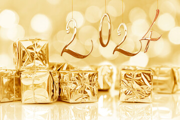 2024, new year card. Small Christmas gifts in shiny golden paper, bokeh lights background