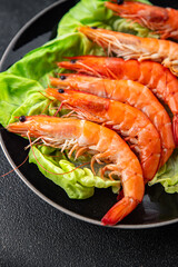 prawn seafood shrimp crustacean langoustine appetizer meal food snack on the table copy space food background rustic top view