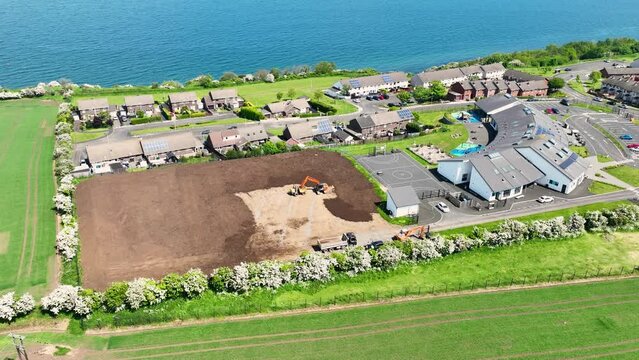 Aerial video of Corran Integrated Primary and Nursery School Larne County Antrim Northern Ireland 2 09-09-2023