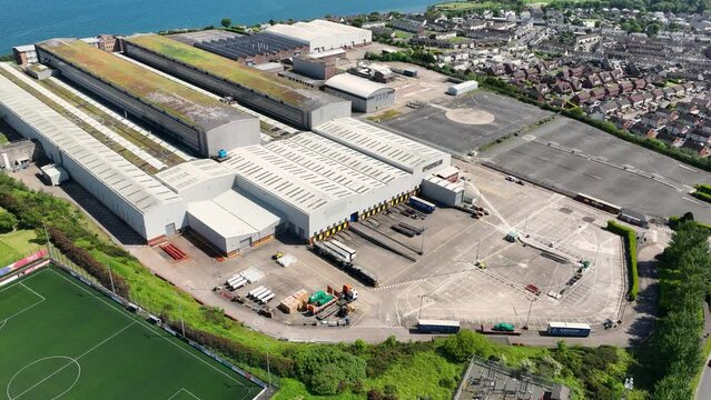 Aerial video of Caterpillar Ltd F G Wilson Engineering Larne County Antrim Northern Ireland 09-09-23.