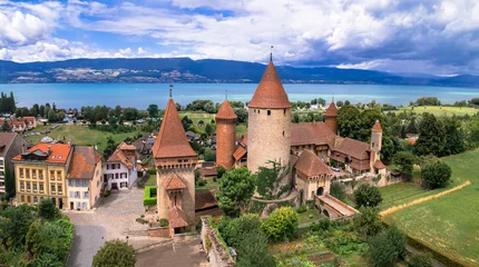 Gartenposter Switzerland scenic places. Estavayer-le-lac - charming traditional village, lake Neuchatel. aerial drone video of medieval castle. Canton Fribourg. © Freesurf