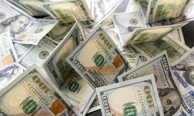  stack of 100 US dollars paper banknotes as finance background