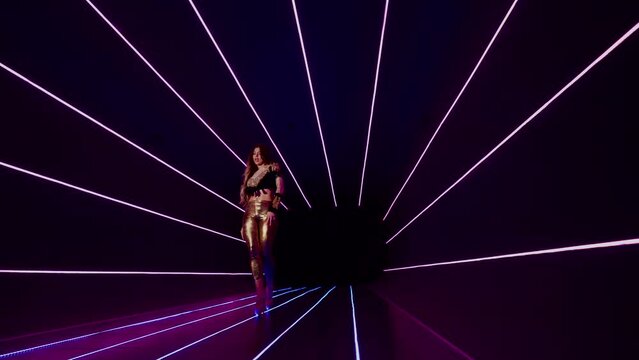 sexy lady in extravagant gown walking in futuristic tunnel with neon illumination, fashion model