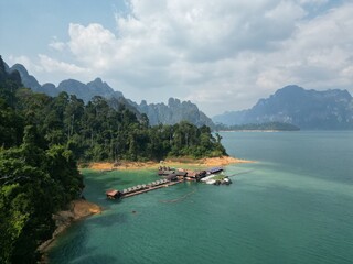Obraz premium Boat trip to the islands in Thailand. Khao Sok National Park and Cheo Lan Lake. Aerial view from a helicopter