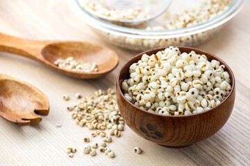 Hot Boiled Job’s Tears millet seed from boiler. White boiled Job’s Tears is highly nutritious cereal healthy fresh organic in salad dish.