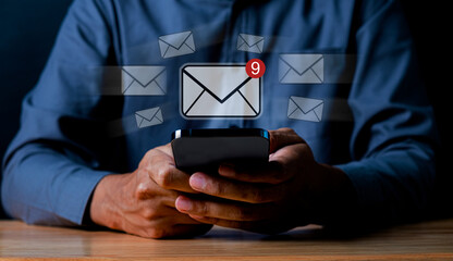 Email marketing concept, a person reading a new message on their smartphone, Connection global...