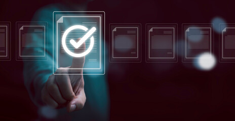 Businessman hand touching to online electronic paper for approve ISO quality document control...