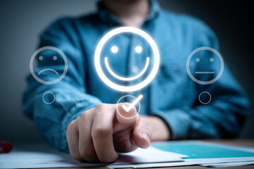 Businessman hand touching to tick approve and select smile face for the best excellent evaluation...