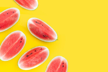 Watermelon on yellow background. Copy space