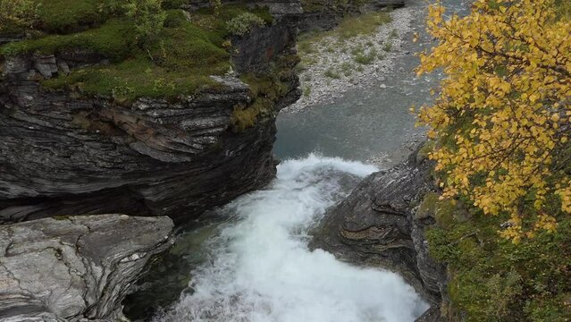 Upstream of the large waterfall. Rovijoki waterfall in Norway. 