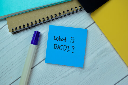 Concept of What is OASDI write on sticky notes isolated on Wooden Table.