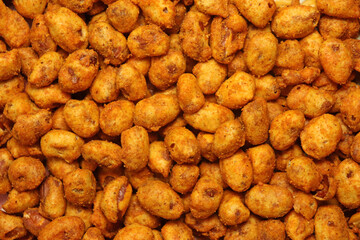 Traditional Indian snacks Peanut masala or Masala groundnut - crispy and tasty besan or chickpea flour coated spices masala groundnuts and deep-fried, served ideally as tea time snack - obrazy, fototapety, plakaty