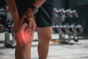 He was holding both hands on his knees. He had a serious knee injury while exercising on the treadmill in the fitness room.
