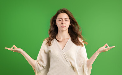 Calm young european lady in casual with closed eyes meditation, resting, enjoy peace